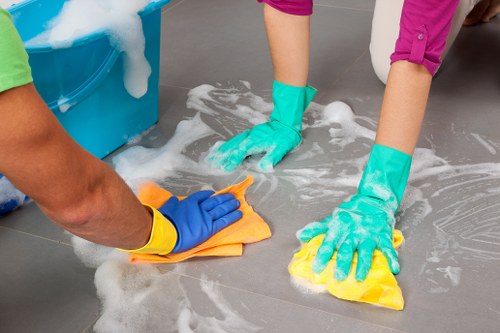 Carpet cleaning technician reviewing a customer complaint with a calm professional approach
