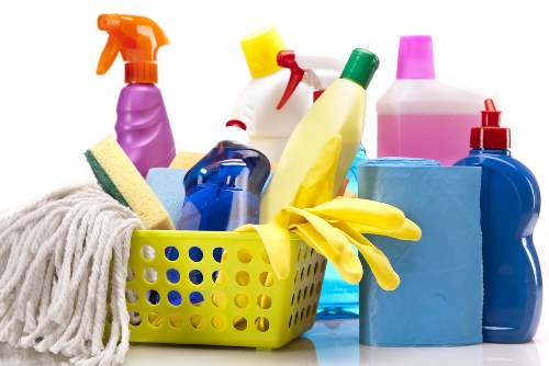 Cleaner using protective equipment during carpet cleaning work
