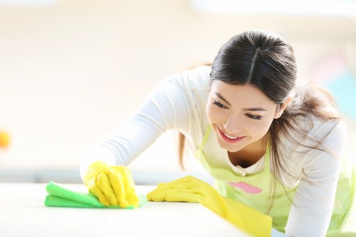 Professional carpet cleaner discussing a service concern and next steps